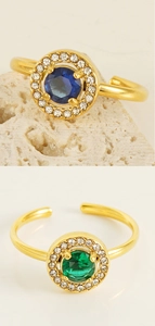 Detail of 18K gold plated stainless steel ring with blue zircon and adjustable band