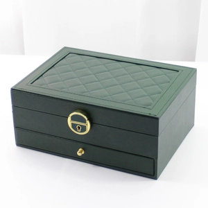 Deep green double-layer faux leather jewelry box with quilted top and gold lock hardware