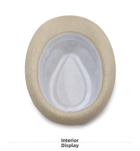 Internal view of the woven straw hat featuring a white sweatband and detailed texture