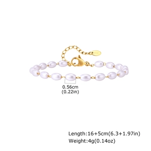 Detail view of pearl and gold chain bracelet with size specs and K18 engraving