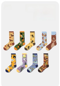 Detail showing a 9-pack of tube socks with various animal prints like dogs and owls