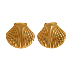 Macro detail of golden scallop shell earrings with polished metallic radial texture