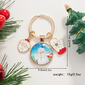 Détail du porte-clés bonhomme de neige de Noël avec pendentifs et marquages de dimensions