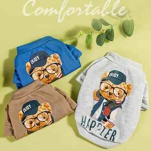 Three colorful cotton pet t-shirts with teddy bear prints and Enjoy lettering design