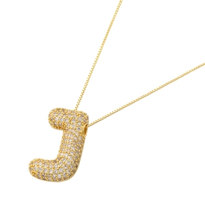 Detailed view of capital letter J balloon pendant with sparkling zircon in 18K gold plating