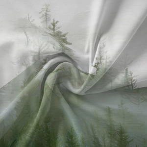 Detail of translucent forest pine print fabric showing soft gradient and light texture