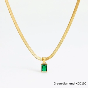 Elegant gold snake chain necklace with square green emerald zircon pendant on white background
