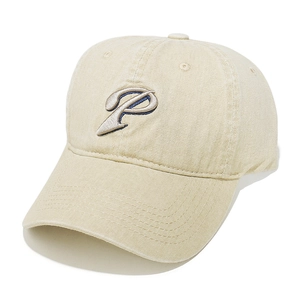Detailed close-up of vintage washed cotton baseball cap with embroidered letter P