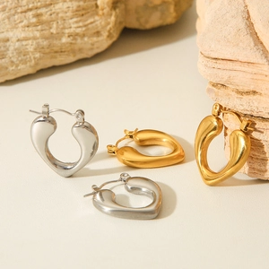 Irregular heart shaped stainless steel earrings in gold and silver finishes