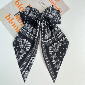 Large retro paisley print bow hair clip with long streamers for elegant women's styling