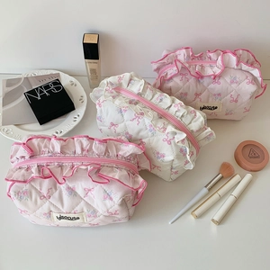 Quilted floral makeup bags with lace trim and zipper closure in pink and white colors