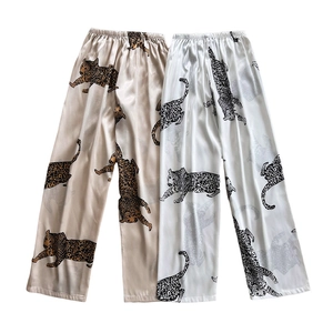 Women ice silk pajama pants with leopard print in champagne and white colors
