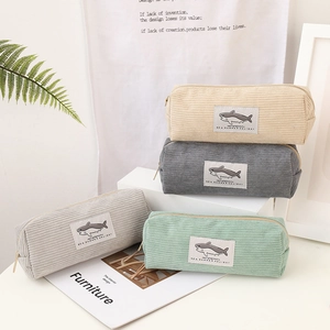 Corduroy shark pencil cases in beige, grey, and green with metallic zippers