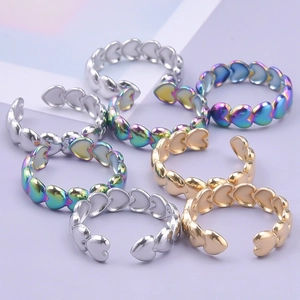 Set of 8 minimalist stainless steel heart-shaped open rings in gold, silver, and multicolor