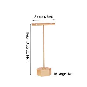 Golden T-shaped metal jewelry stand with hexagonal base for earrings, size 14cm height