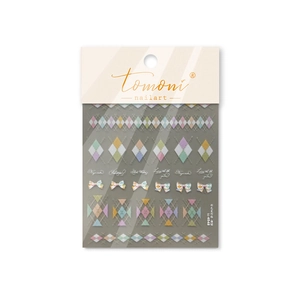 Colorful diamond grid nail art stickers with small bows on white packaging card