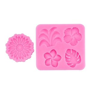Pink silicone flower mold set including sunflower and tropical leaf designs for fondant