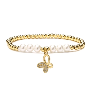 Golden 4mm beaded bracelet with white pearls and a sparkling zircon butterfly pendant