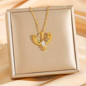 Luxury gold bird necklace with colorful crystals and a teardrop zircon pendant