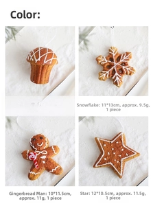Detailed view of gingerbread-style Christmas ornaments with sizes and hanging strings