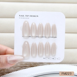 Handmade light brown cat eye press-on nails in elegant long almond shape, 10-piece set