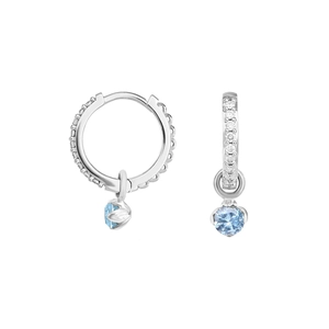 Macro detail of S925 sterling silver hoop earrings with light blue round crystal drops