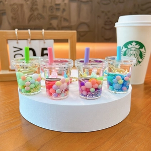 Set of 4 creative boba tea liquid quicksand keychains in colorful miniature cups