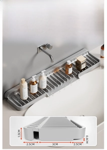 Macro detail of grey silicone kitchen sink drainage mat with specific size measurements