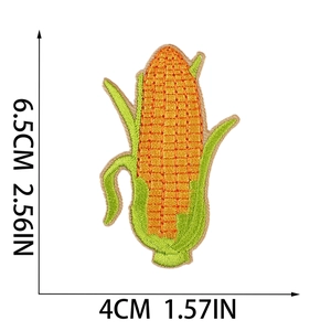 Detailed view of yellow corn embroidered patch with size markers in cm and inches