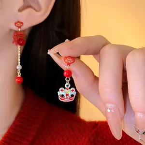 New Chinese style lion and pearl drop earrings in red enamel finish for the Lunar New Year