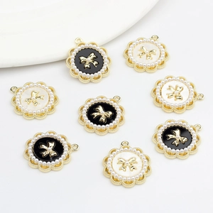 Lace-edged round alloy pendants with pearls and golden bows for DIY earrings
