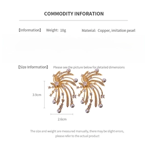 Detailed size specifications for gold shooting star earrings with measurements and material info