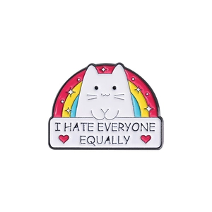 Cartoon white cat enamel pin with rainbow design and I Hate Everyone Equally slogan