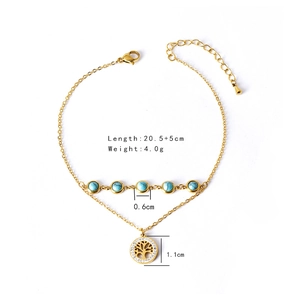 Gold double-layered anklet with blue turquoise beads and tree of life pendant detail