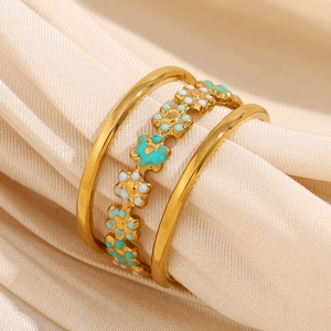 Three-layer 18K gold plated stainless steel open ring with blue and white enamel flowers