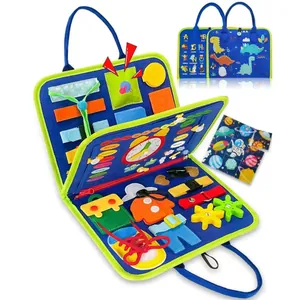 Detail view of Montessori busy board showing felt clock, gears, and buckle skills