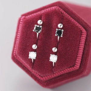 925 silver clip-on earrings with black and white zircon in a red velvet jewelry box
