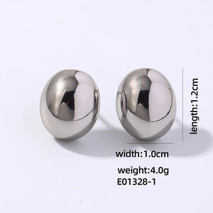 Detailed view of silver oval stud earrings with high-polish finish and minimalist design