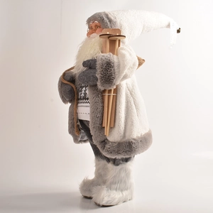 Detail of 45cm Santa figurine in white and grey ski outfit with wooden skis and poles