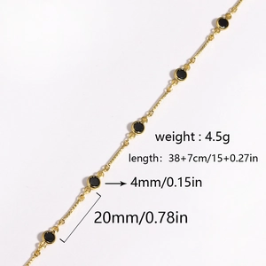 Detail view of gold chain necklace with 4mm black zircon pendant including size measurements