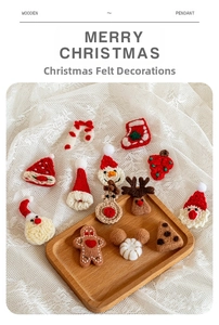 Detailed macro of handcrafted crochet Christmas ornaments on white lace and wood