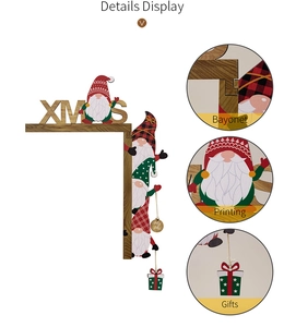 Detail view of wooden Xmas door frame decor with Gnomes and a Gift pendant