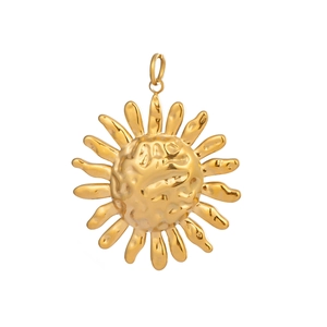 Detailed close-up of a 18K gold-plated stainless steel sun pendant with textured surface