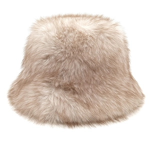 Detailed close-up of fluffy faux fur texture on a warm beige winter bucket hat
