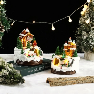 Luminous Christmas resin gingerbread house and castle set with warm LED lights