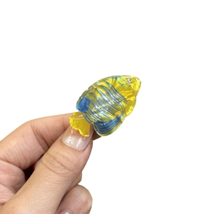 Mini acrylic dolphin hair clip with blue stripes and rhinestone eye in bright yellow