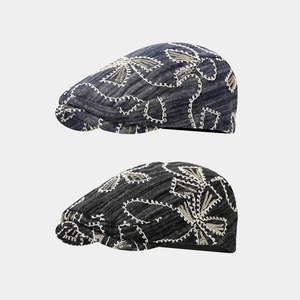 Vintage denim newsboy caps with floral embroidery and sequins in navy and dark grey