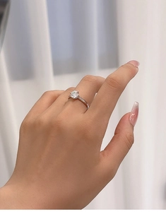 Macro detail of 1CT round moissanite engagement ring set in 925 sterling silver band