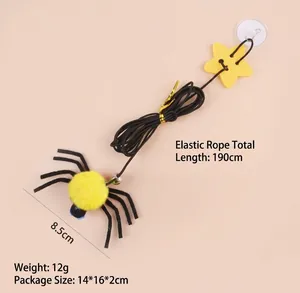 Detail of yellow spider cat toy with 190cm elastic string and suction cup attachment