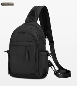 Black nylon sling bag detail, featuring multi-zipper pockets and adjustable strap for daily use.
